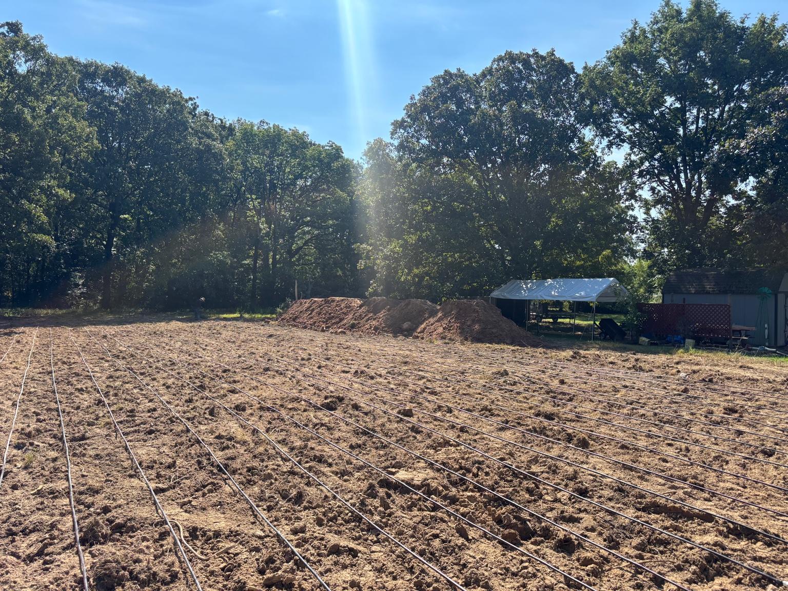 Drain field lateral lines being installed