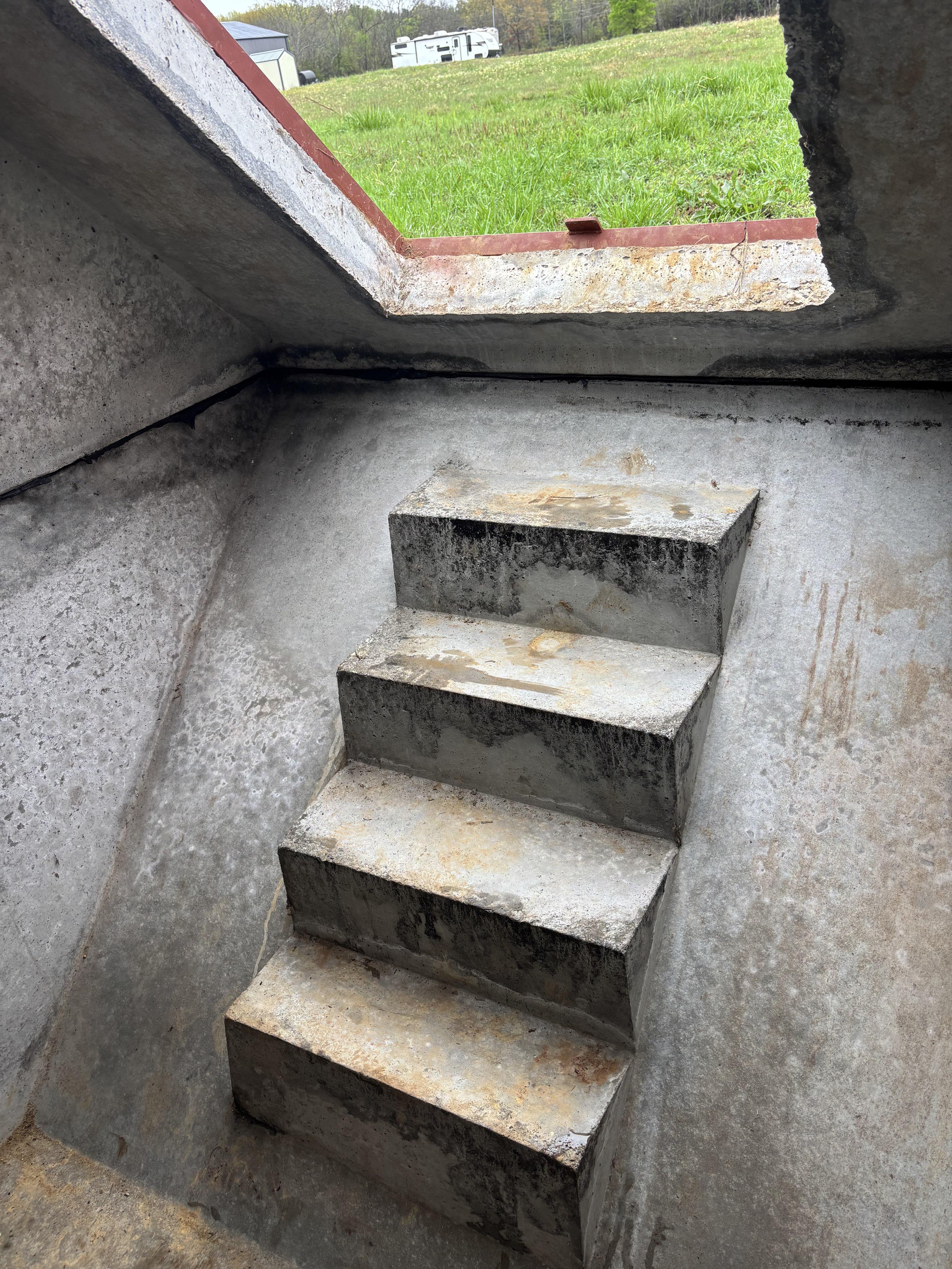 Concrete storm shelter interior stairs